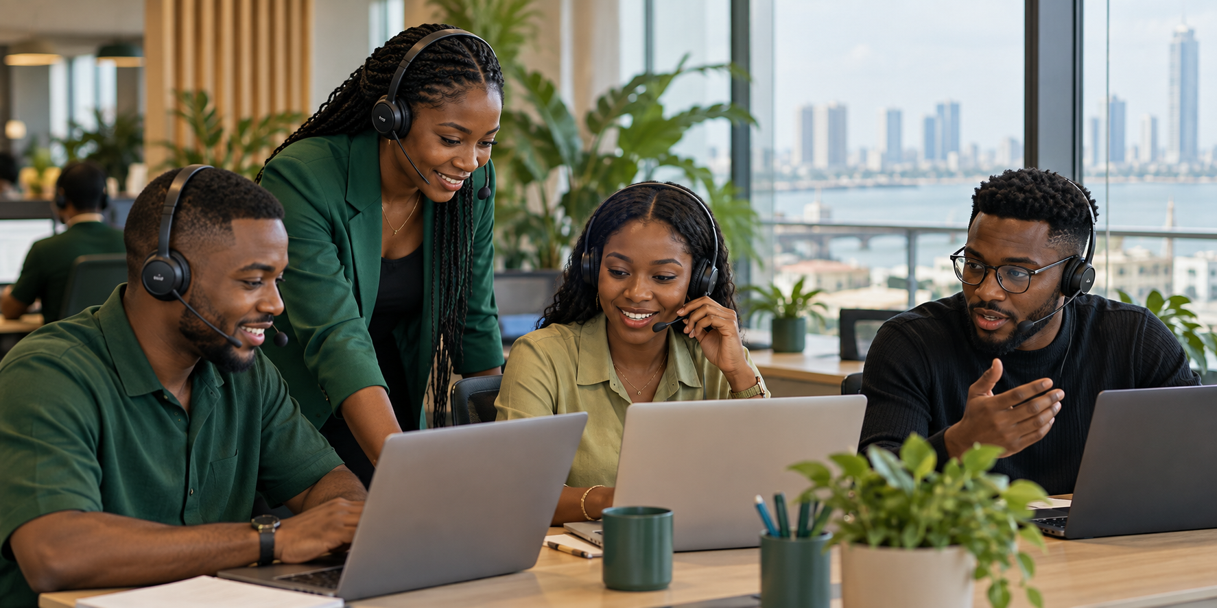 Customer support agents collaborating in a modern office